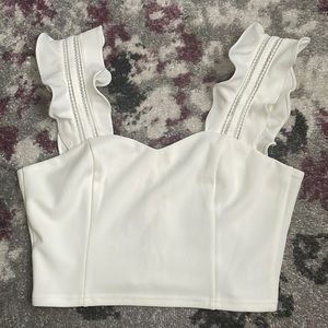 Knit crop top with ruffle straps and zip back